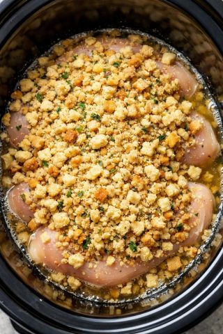 Put raw chicken breasts in the slow cooker, pour dry stuffing mix over the top, and get a meal so delicious your family will be begging for more.